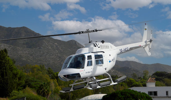 Heliair Bell 206 flying
