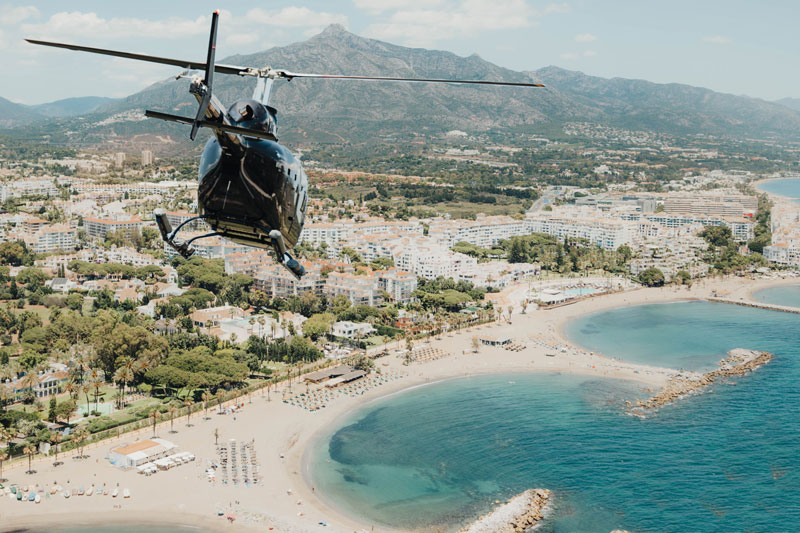 Bell 505 flying over Marbella