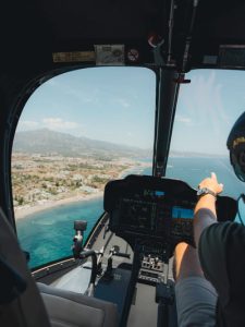 Heliair Marbella Bell-505 pilot in cockpit show Marbella